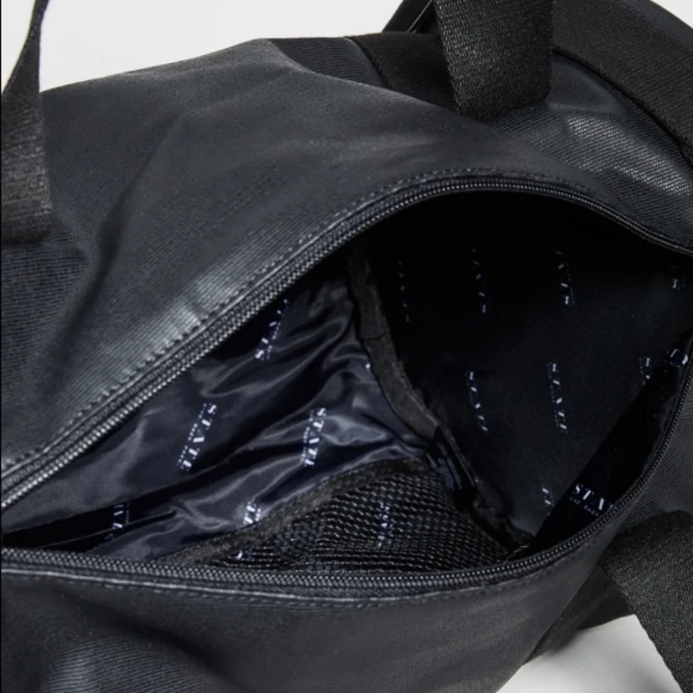 NWOT STATE Felix black duffle bag